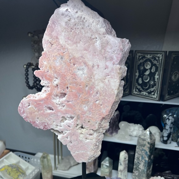 Pink amethyst slab on stand